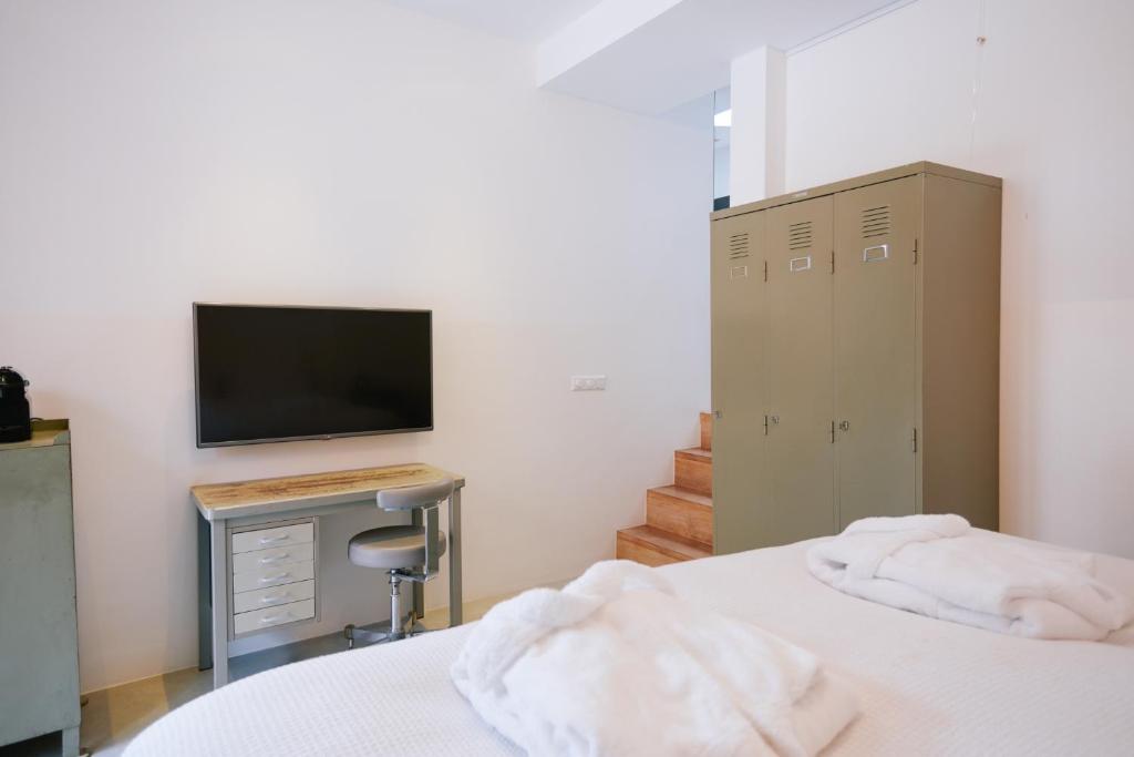 Postel nebo postele na pokoji v ubytování Hotel Karel
