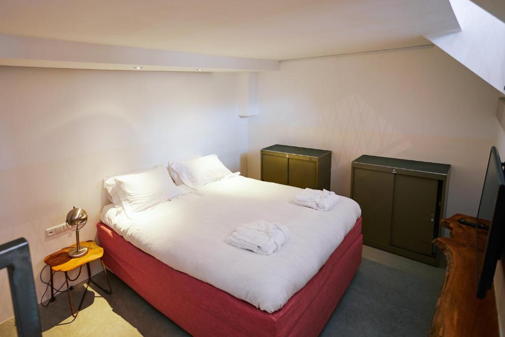Postel nebo postele na pokoji v ubytování Hotel Karel