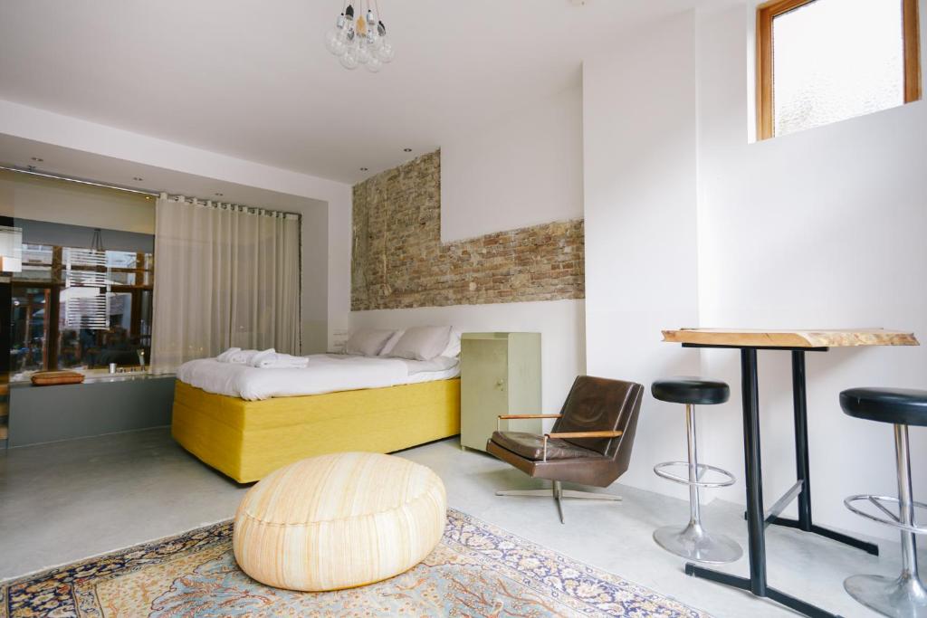 Postel nebo postele na pokoji v ubytování Hotel Karel