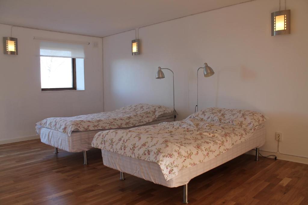 Postel nebo postele na pokoji v ubytování Stålemara Gård Prutgåsen