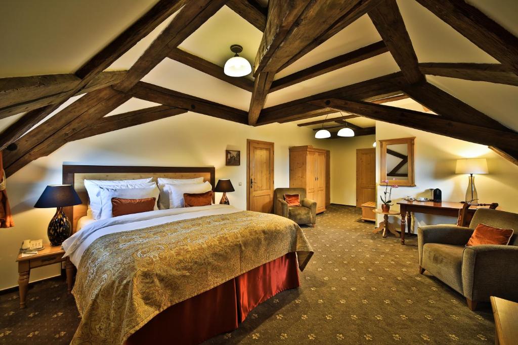 Postel nebo postele na pokoji v ubytování Questenberg Hotel