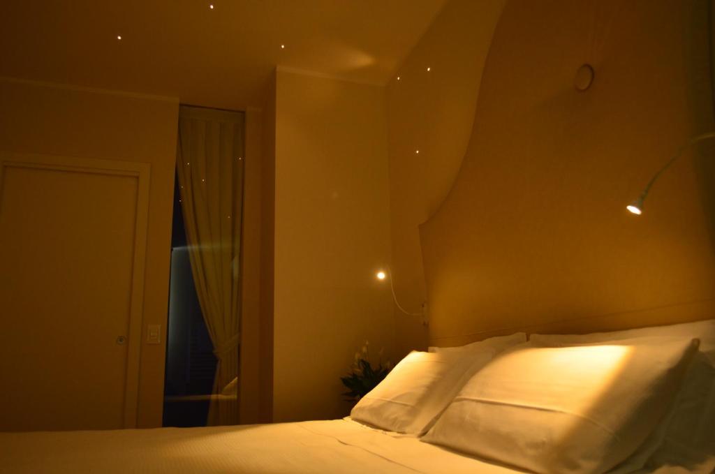 Postel nebo postele na pokoji v ubytování M14 Hotel & Spa