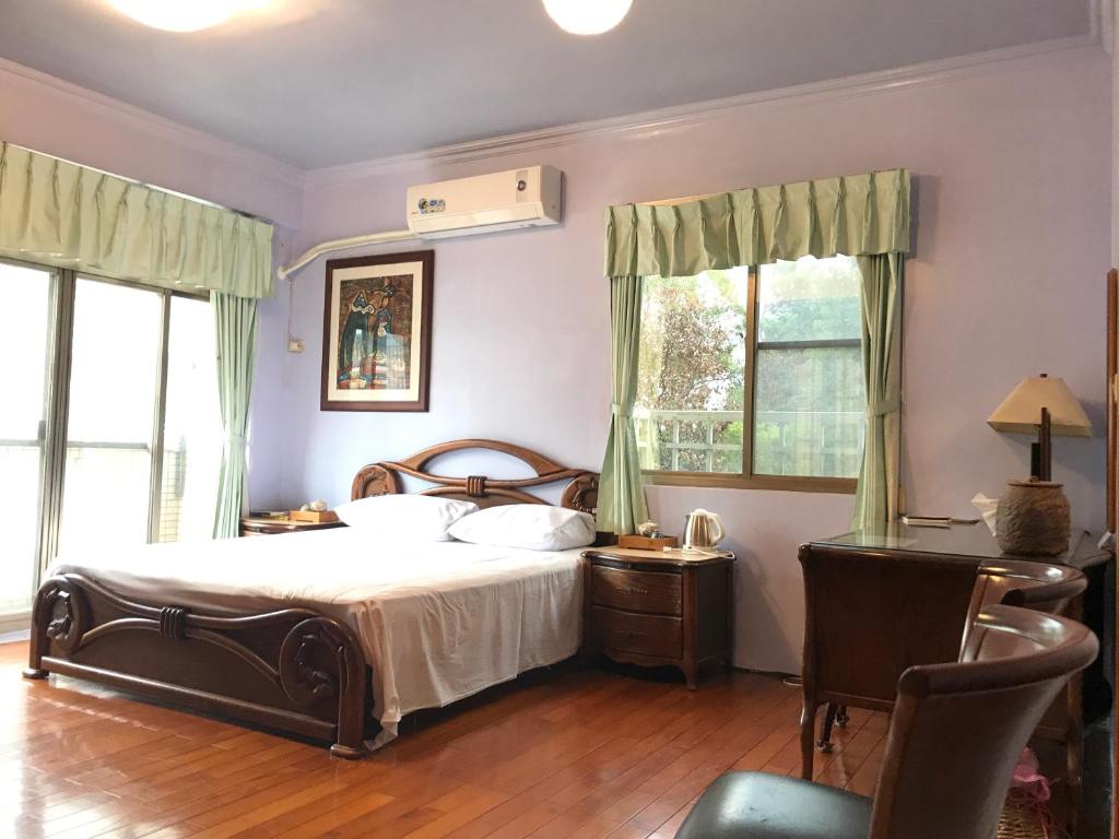 Postel nebo postele na pokoji v ubytování Sin Ya Homestay