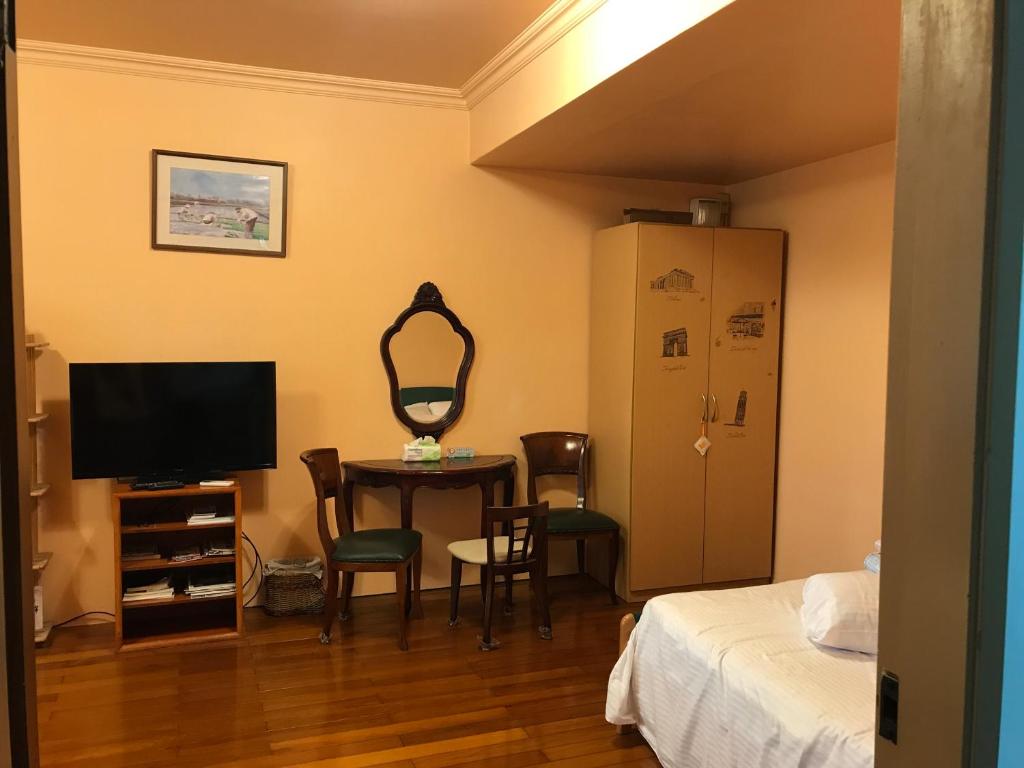 TV a/nebo společenská místnost v ubytování Sin Ya Homestay