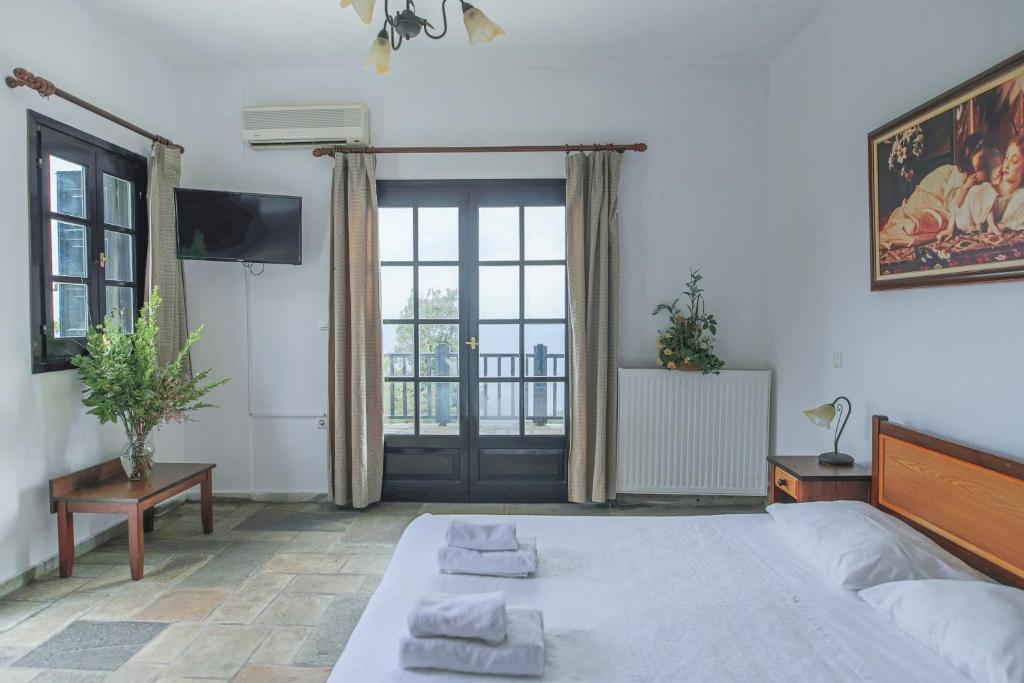 Posteľ alebo postele v izbe v ubytovaní Pilio Sea Horizon Hotel