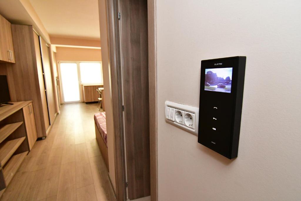 TV a/nebo společenská místnost v ubytování City Premium Apartments