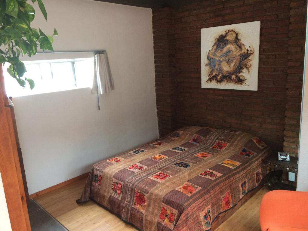 Postel nebo postele na pokoji v ubytování B&B Oui Madame