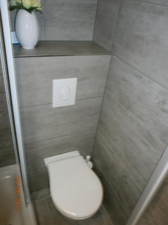 Koupelna v ubytování Vakantiehuisje Bredene