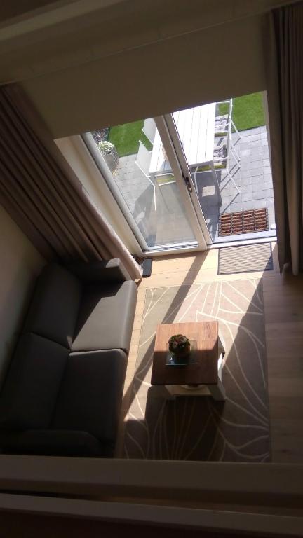 Posezení v ubytování Vakantiehuisje Bredene