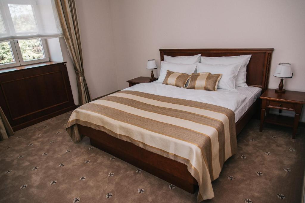 Posteľ alebo postele v izbe v ubytovaní Hotel Stara Lika