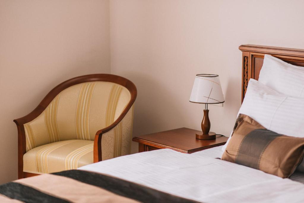Posteľ alebo postele v izbe v ubytovaní Hotel Stara Lika