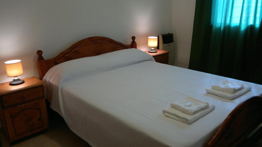 Postel nebo postele na pokoji v ubytování BAMBÚ Apart