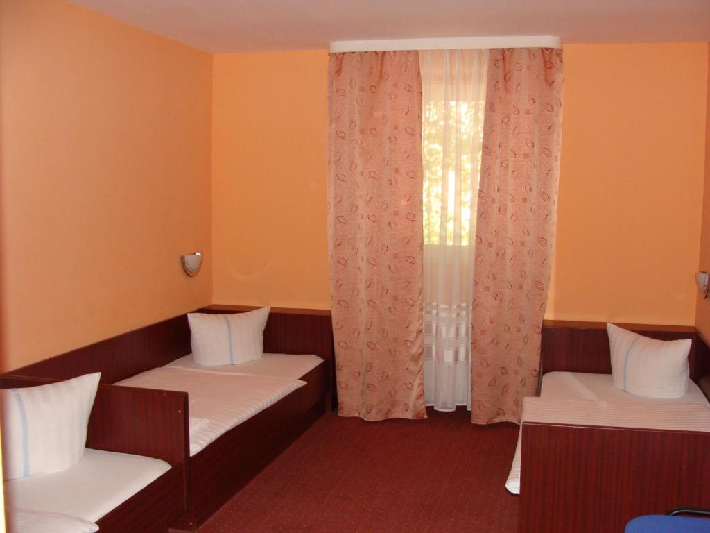 Postel nebo postele na pokoji v ubytování Hostel Lan