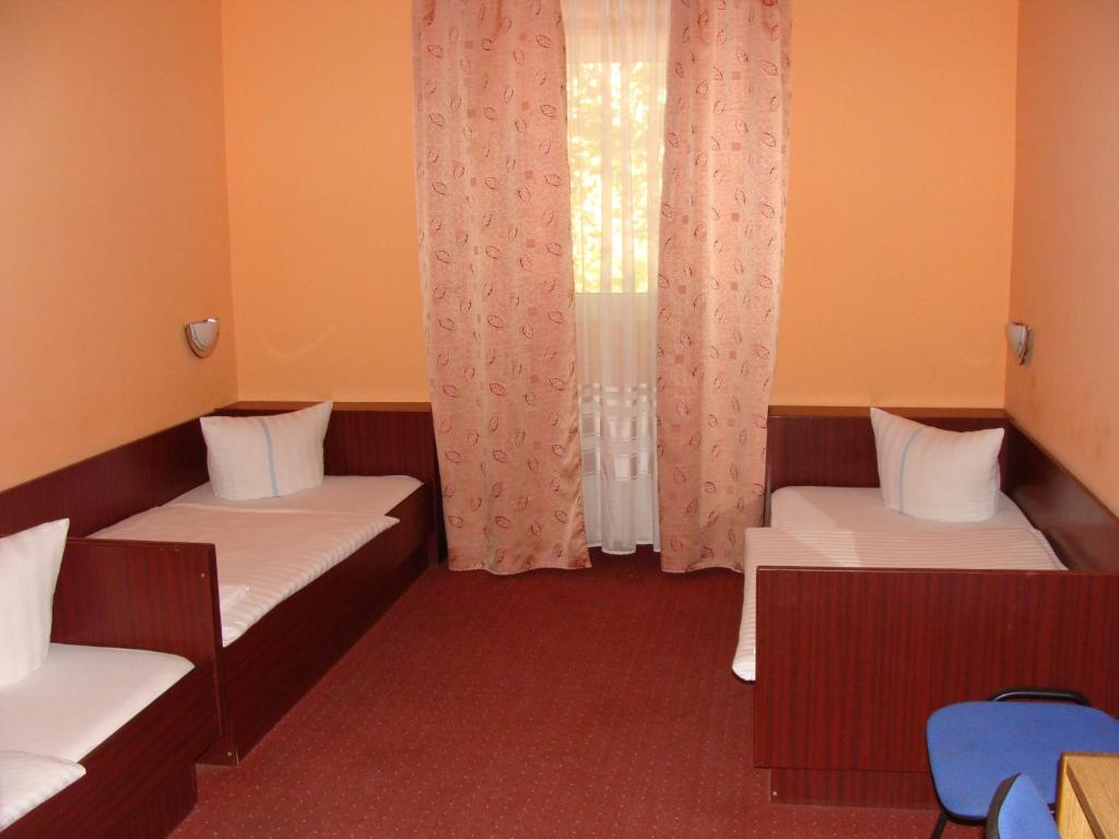 Postel nebo postele na pokoji v ubytování Hostel Lan