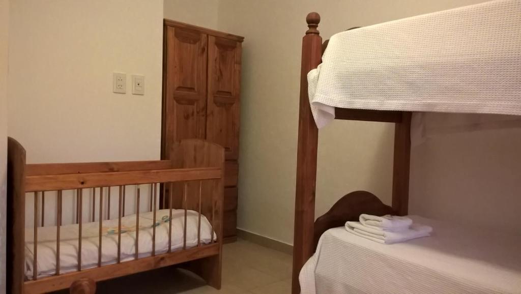 Postel nebo postele na pokoji v ubytování BAMBÚ Apart