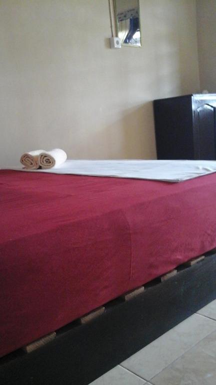 Postel nebo postele na pokoji v ubytování Beach Guest House