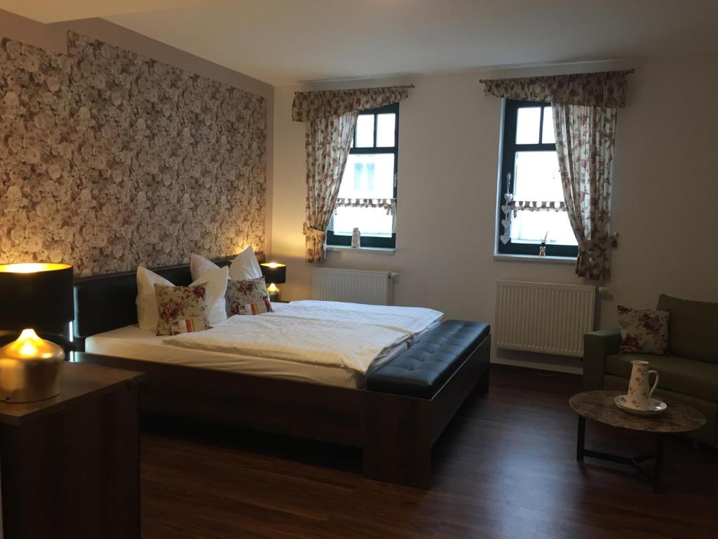 Postel nebo postele na pokoji v ubytování Hotel Trendtino