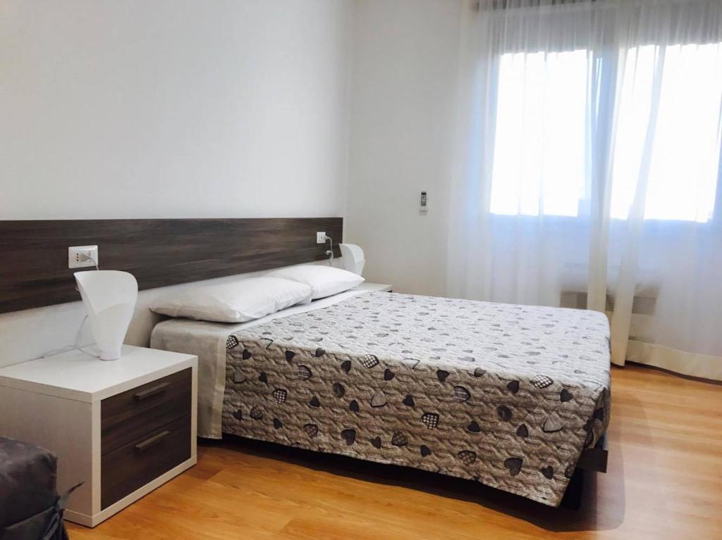 Posteľ alebo postele v izbe v ubytovaní Four Rooms Guesthouse