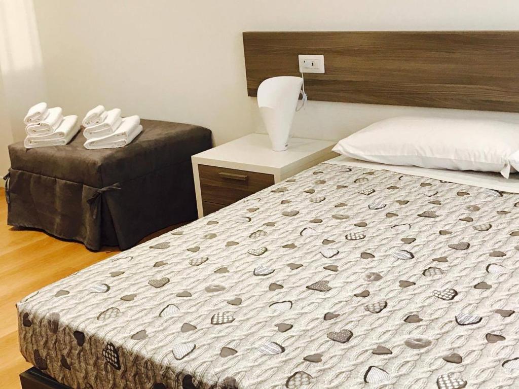 Posteľ alebo postele v izbe v ubytovaní Four Rooms Guesthouse