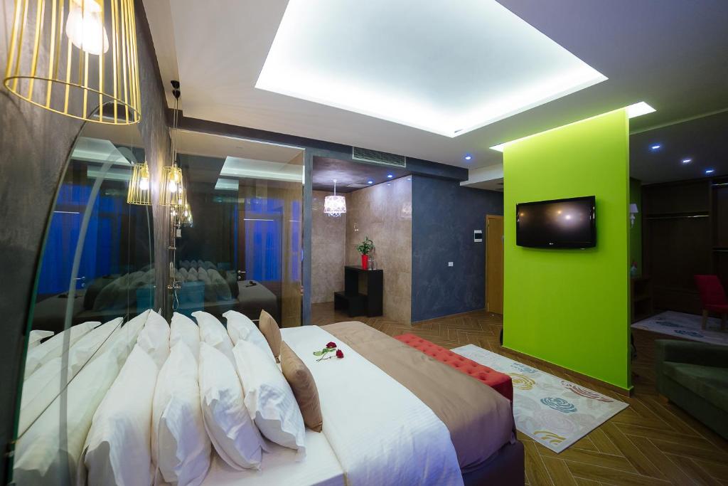 Postel nebo postele na pokoji v ubytování Horizont Hotel