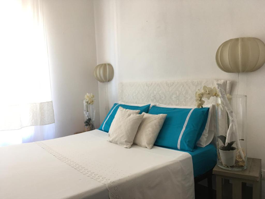 Postel nebo postele na pokoji v ubytování Bogamarì