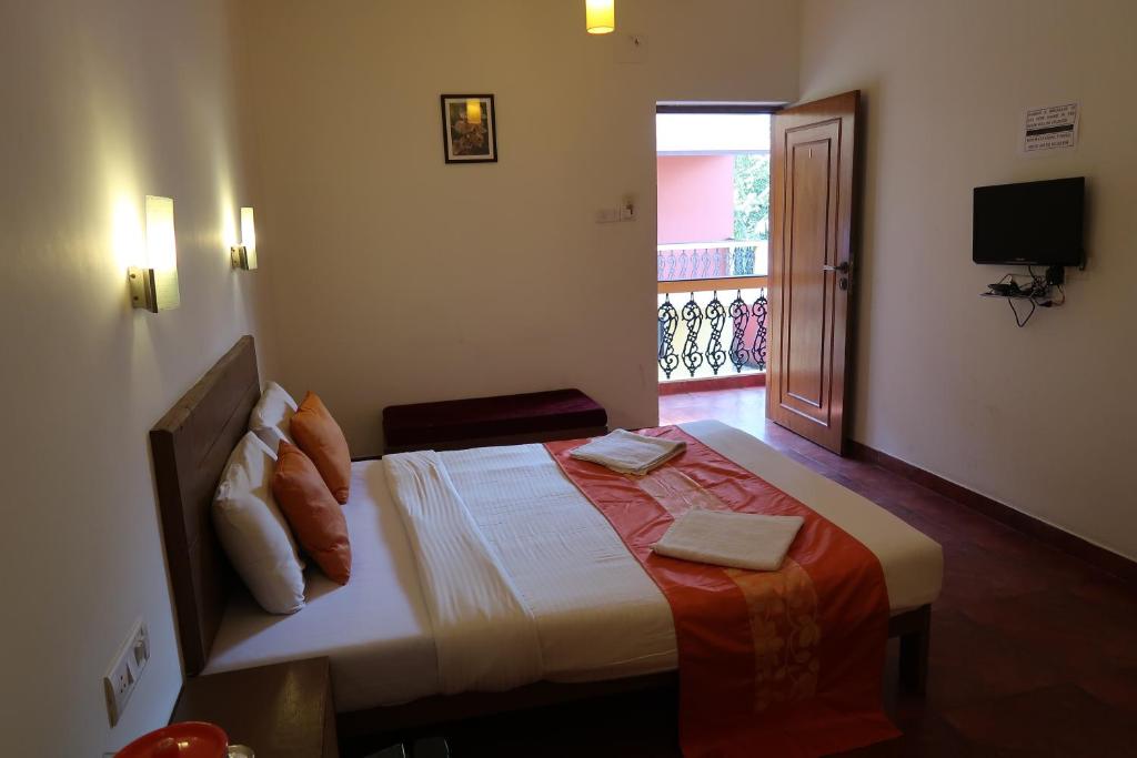 Postel nebo postele na pokoji v ubytování Hotel Celi