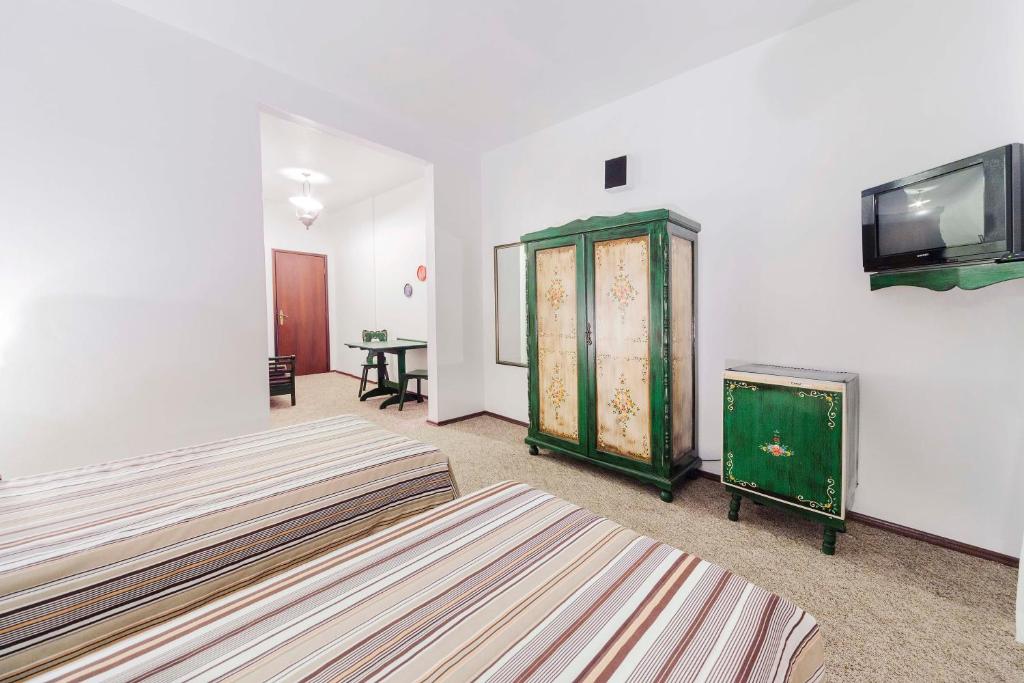 Postel nebo postele na pokoji v ubytování Hotel Tannenhof
