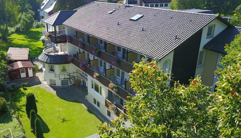 an aerial view of a house with a roof at Kurhotel Eichwaldeck in Bad Wörishofen