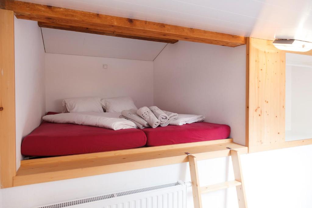 Una cama o camas en una habitaci&oacute;n de Haus Angelika