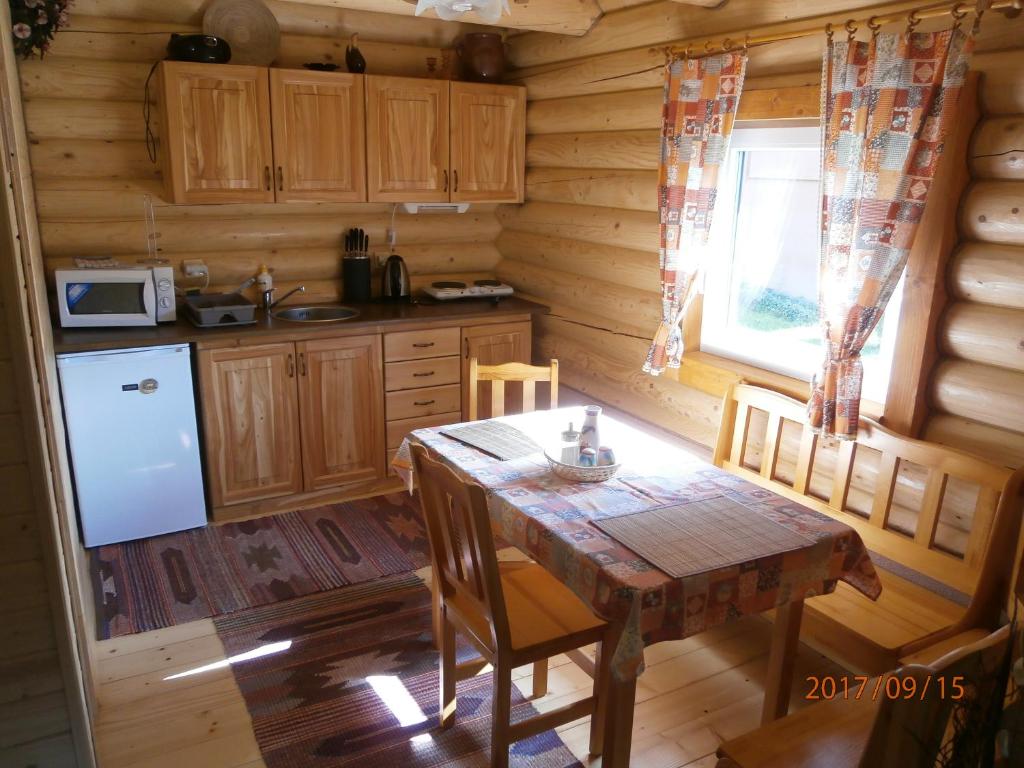 Kuchyňa alebo kuchynka v ubytovaní Drevenica Silvia