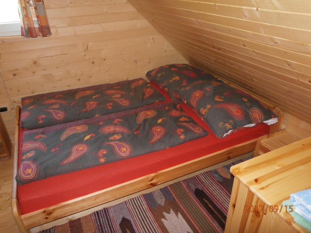 Posteľ alebo postele v izbe v ubytovaní Drevenica Silvia