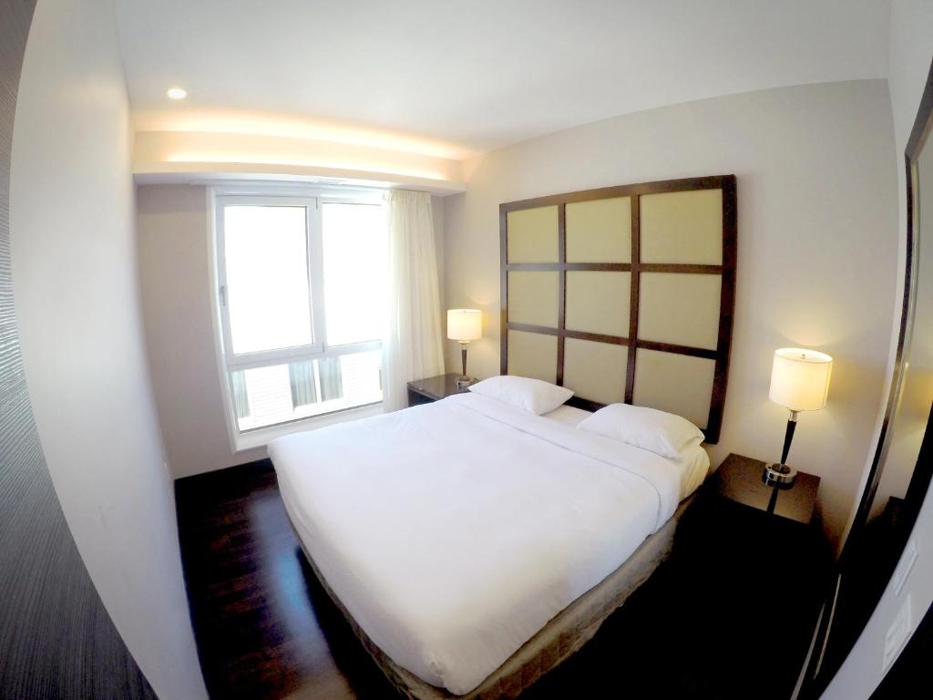 Postel nebo postele na pokoji v ubytování M Montreal Hostel