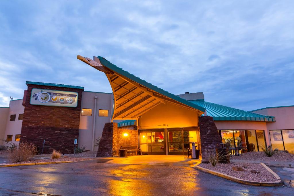 a building with a sign on the front of it at Hualapai Lodge in Peach Springs