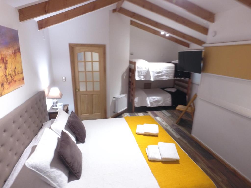 Katil atau katil-katil dalam bilik di Hostal Fernando de Magalhaes