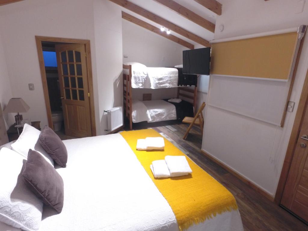 Katil atau katil-katil dalam bilik di Hostal Fernando de Magalhaes