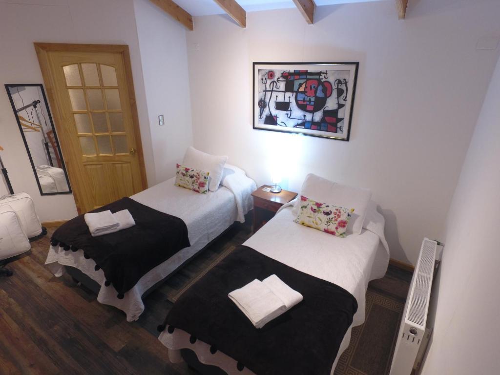 Katil atau katil-katil dalam bilik di Hostal Fernando de Magalhaes