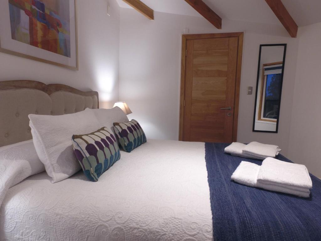 Katil atau katil-katil dalam bilik di Hostal Fernando de Magalhaes