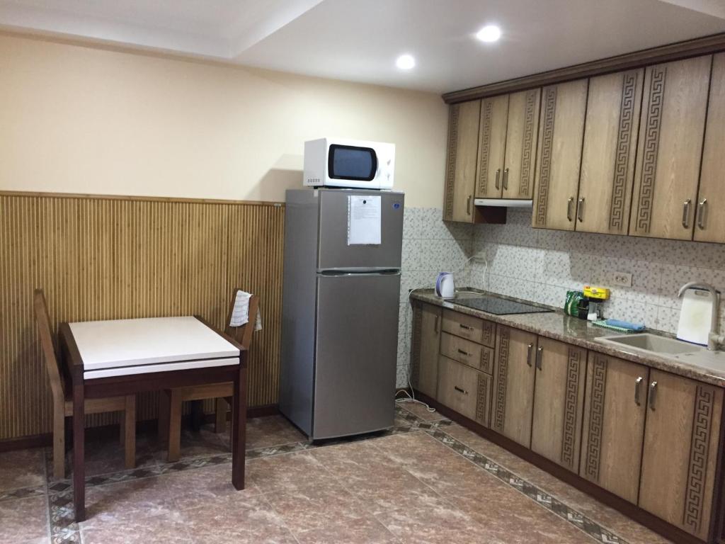 Kuchyň nebo kuchyňský kout v ubytování Mini hotel Solnce Karpat