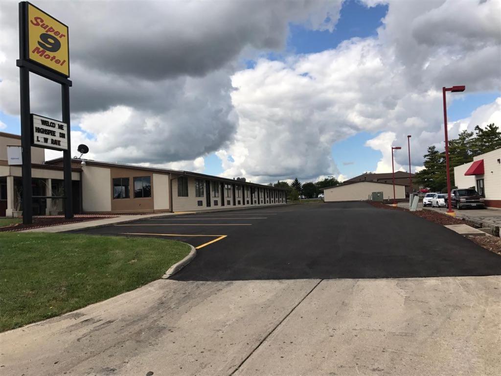 an empty street in front of a gas station at Super 9 Motel Troy in Troy