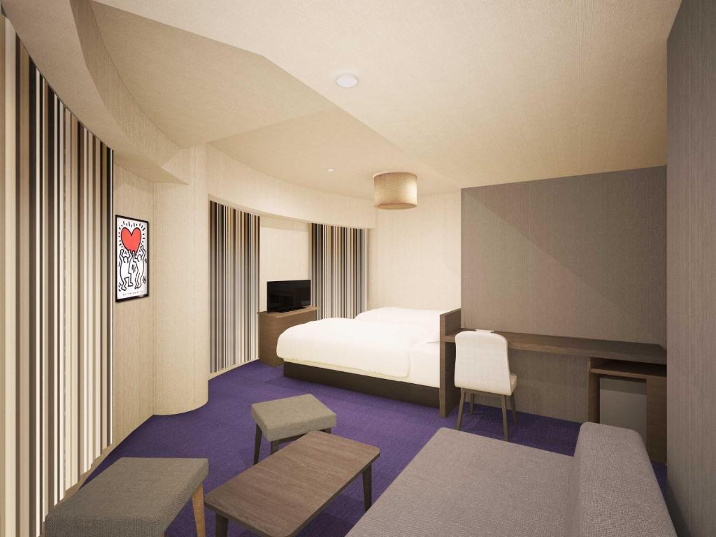 a hotel room with a bed and tables and chairs at Sotetsu Fresa Inn Tokyo-Toyocho in Tokyo