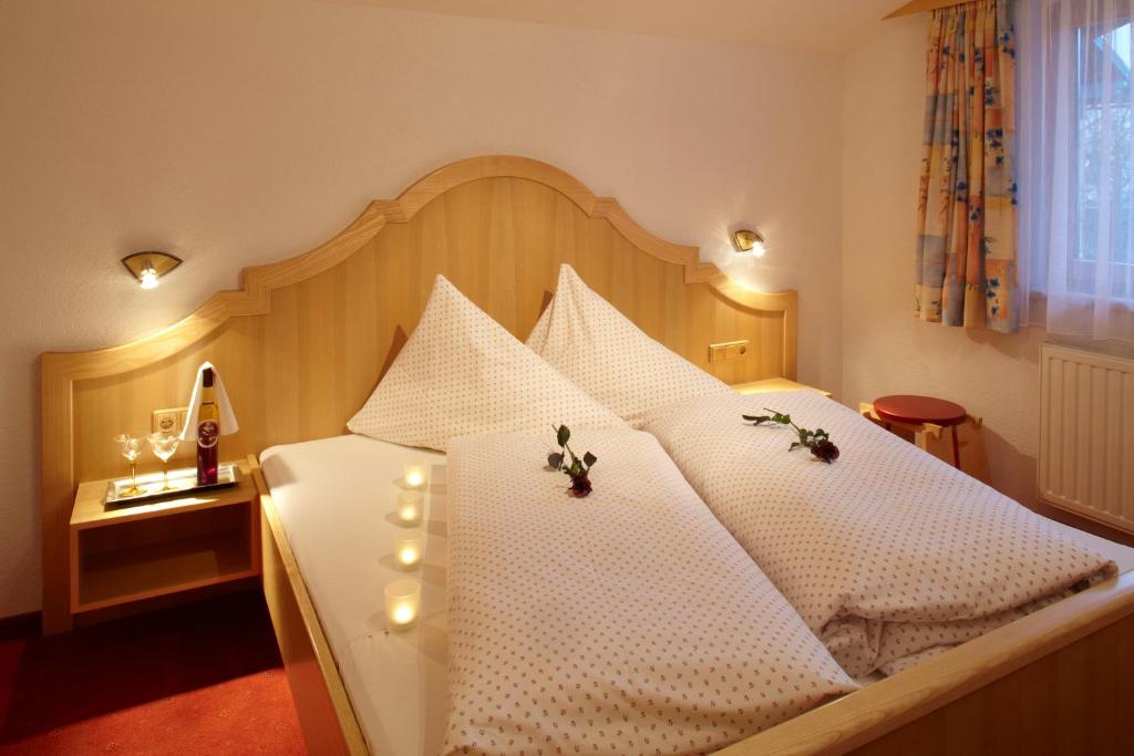 Posteľ alebo postele v izbe v ubytovaní Das Apartment Rief daheim beim Wanderprofi Adults Only