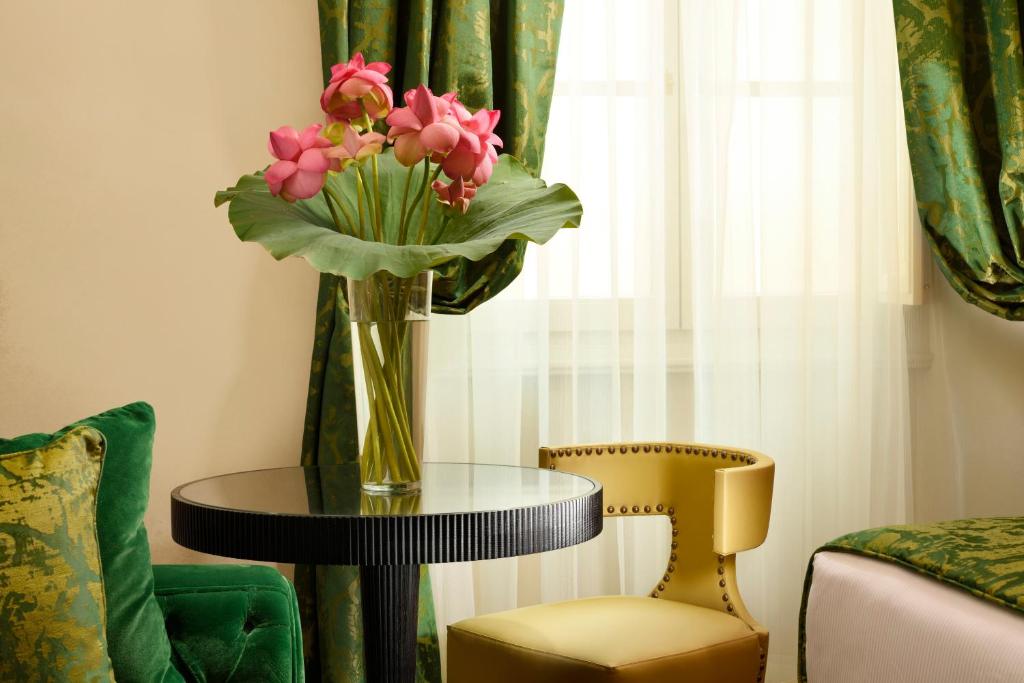 Posedenie v ubytovaní San Firenze Suites & Spa