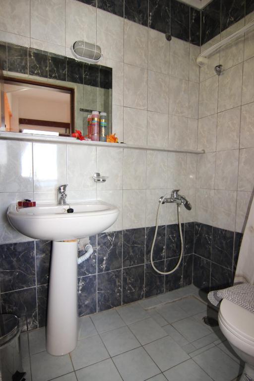 Koupelna v ubytování Lofos Hotel