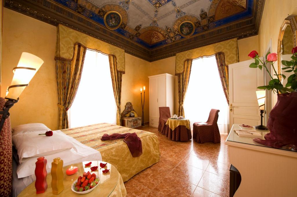 Postel nebo postele na pokoji v ubytování Hotel Joli