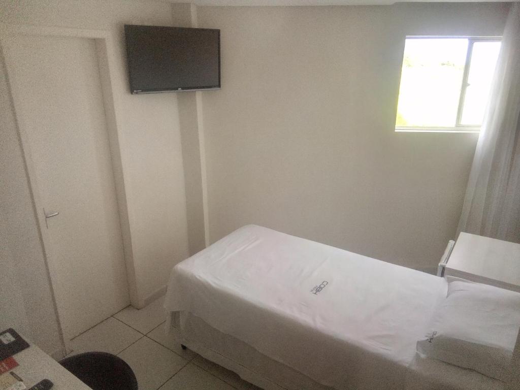 TV a/nebo společenská místnost v ubytování COBH Hotel