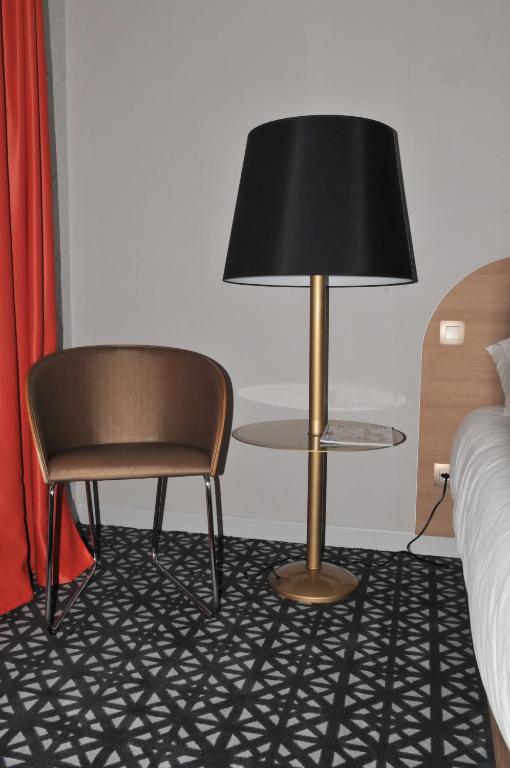 Postel nebo postele na pokoji v ubytování Hôtel Beau Rivage