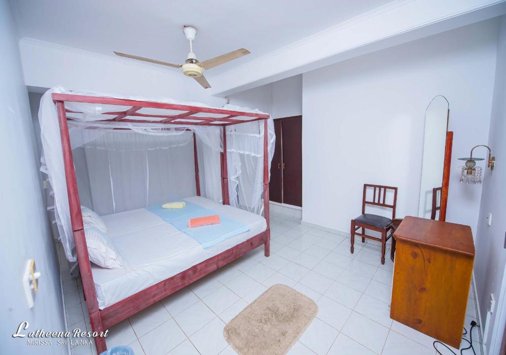 Postel nebo postele na pokoji v ubytování Latheena Resort