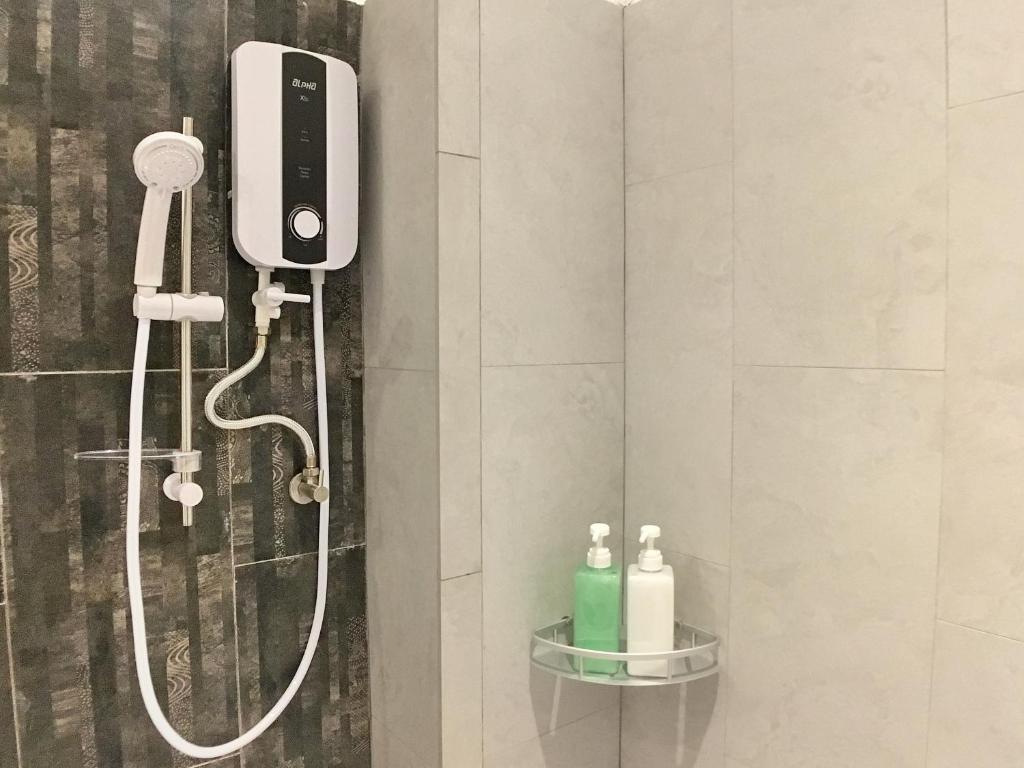 Koupelna v ubytování iBook Gurney Suites