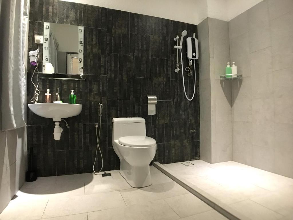 Koupelna v ubytování iBook Gurney Suites