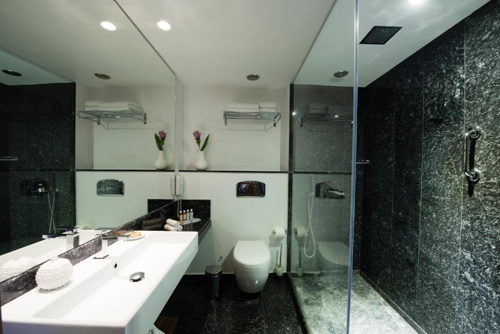A bathroom at Aquila Atlantis Hotel